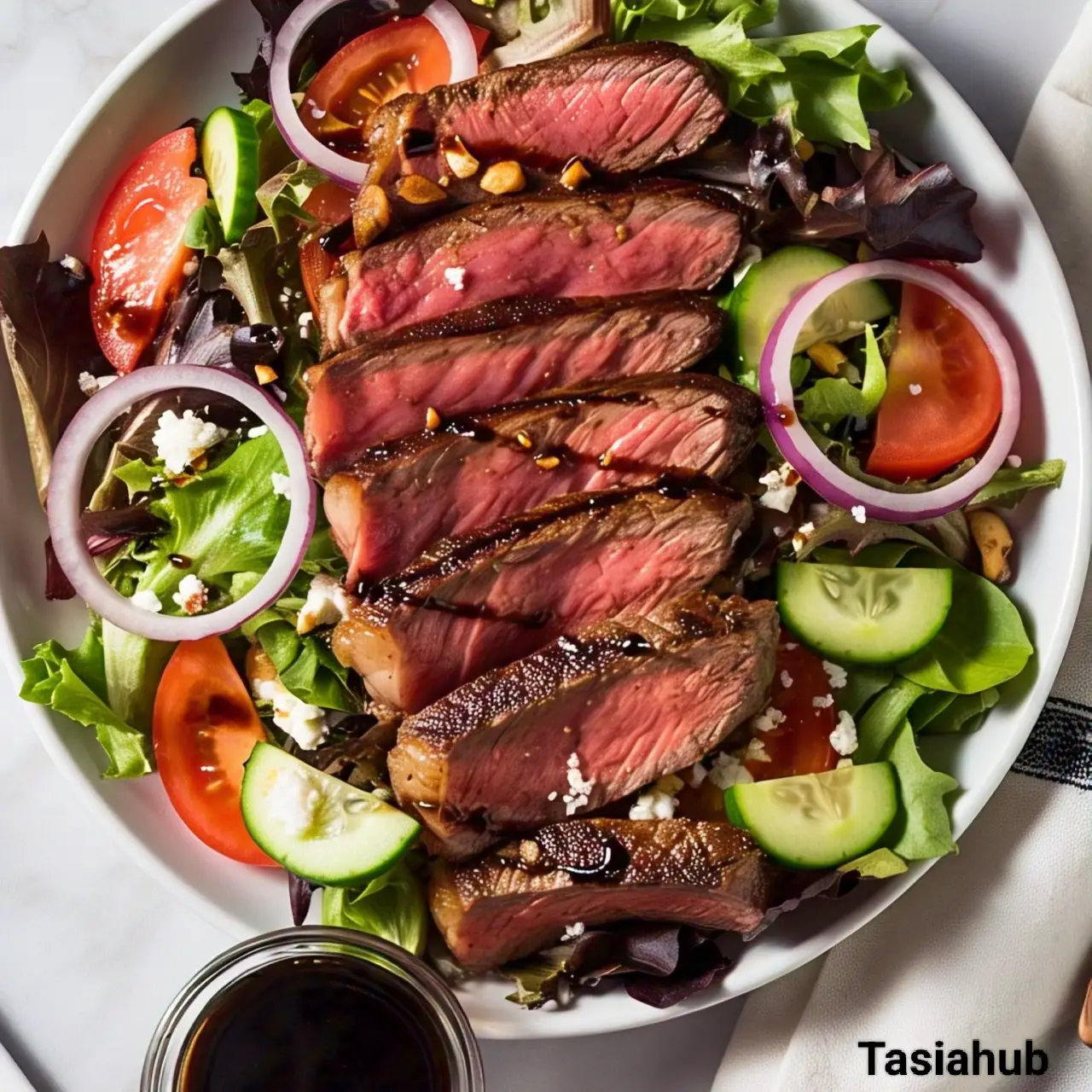 A bowl of steak salad