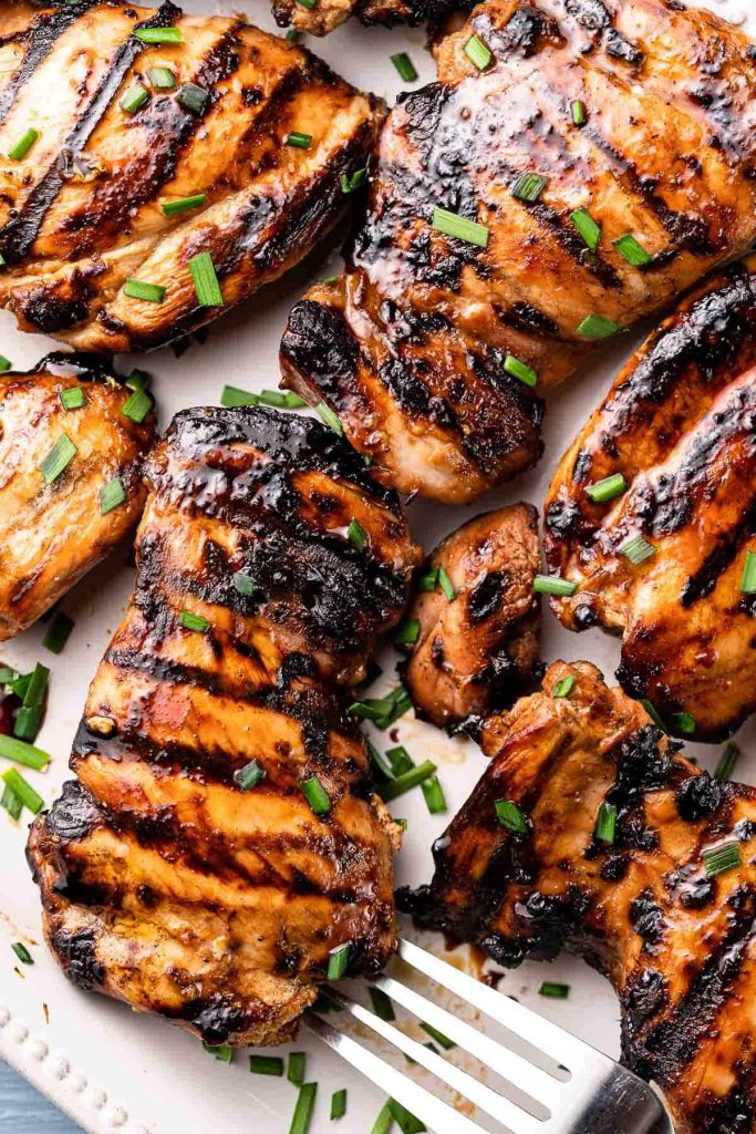 Grilled balsamic chicken on platter
