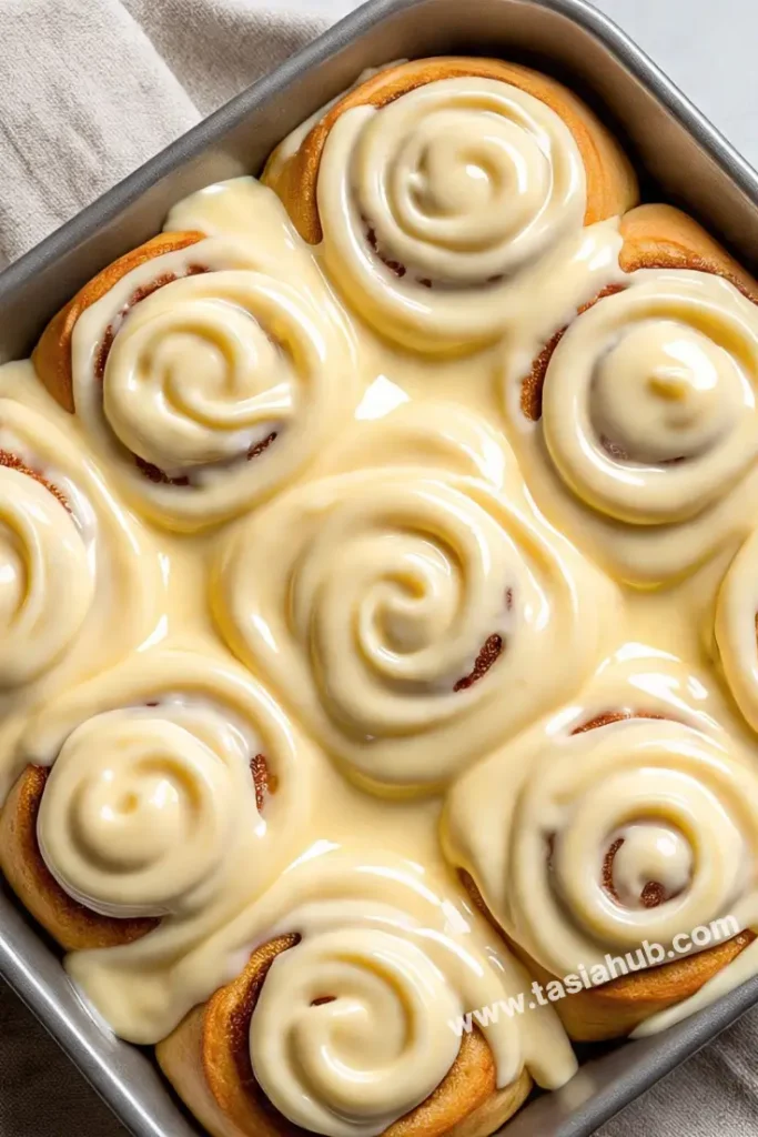 a sheet pan of pumpkin cinnamon rolls