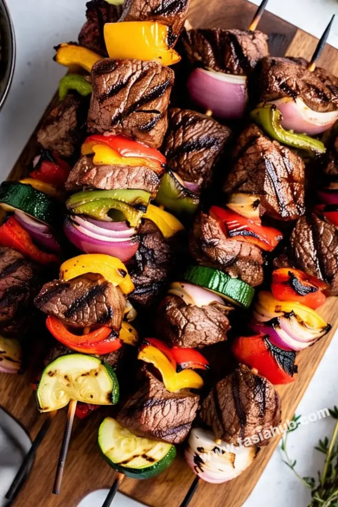 grilled steak kabobs on the grill