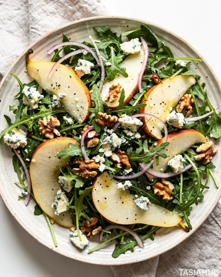 Arugula Pear Blue Cheese Salad dish